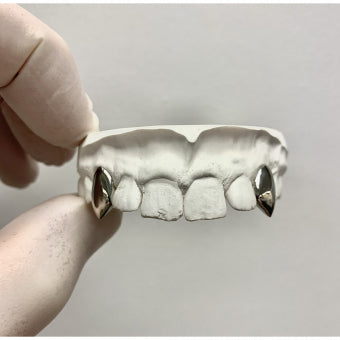 Vampire Fangs Gold grillz custom made for a perfect fit